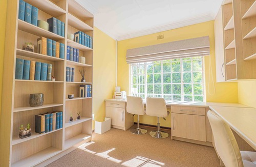 Greater Johannesburg Metropolitan Area House | Spacious Manor with Cozy Fireplace, Garden & Pool