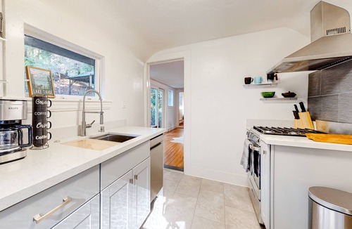 Mill Valley Cottage | Sweet cottage in the woods with fireplace & patio - steps to town & trails