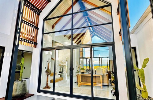 Shelley Point House | Thalassophile is a 4-bedroom house in St Helena Bay with direct Beach Access.