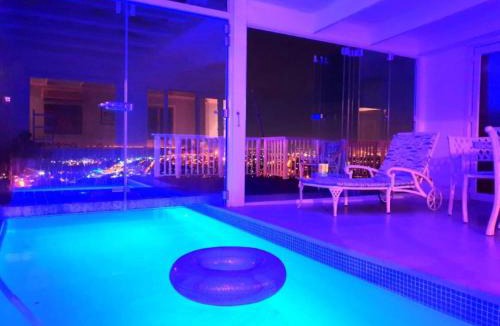 Mountainside House | 'The Bolussi Beachhouse', sleeps 12 in 6 en-suite bedrooms with Indoor Pool