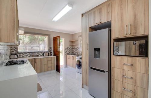 Greater Johannesburg Metropolitan Area House | The Cycad. 4-Bed Home next to Clearwater Mall