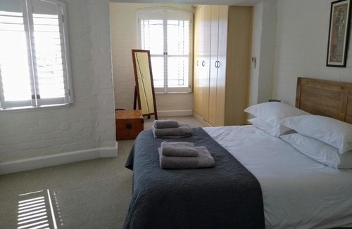 Scott Estate Apartment | The Village apartment with beach and mountain views