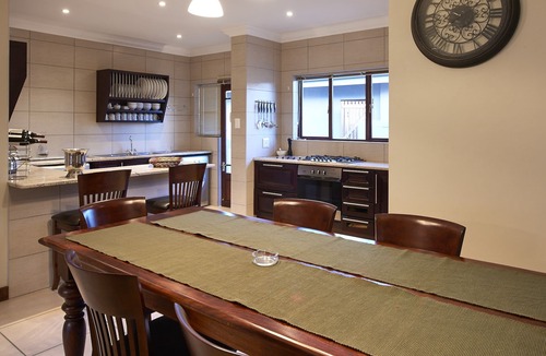 Clarens House | This holiday home has a balcony, stove top and kitchen
