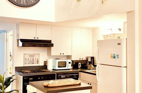 China Basin Apartment | Tranquil Historical clocktower loft with parking lot in San Francisco
