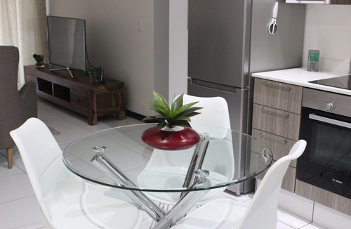 Greater Johannesburg Metropolitan Area Condo | Two bedroom ground floor condo unit with private garden, 5 min from Monte Casino