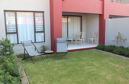 Greater Johannesburg Metropolitan Area Condo | Two bedroom ground floor condo unit with private garden, 5 min from Monte Casino