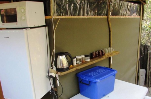 Thorny Bush Game Reserve Cabin | Two Bedroomed Bush-tent on the Klaserie River, with free lion / hyena sounds.