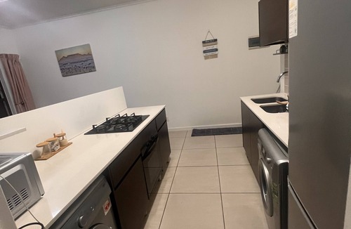 Greater Johannesburg Metropolitan Area Apartment | Unique and comfortable accommodations in the heart of our vibrant city.