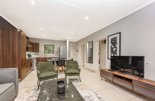 Sandown Apartment | Unwind in Luxury:2BR in Sandton w/Private Balcony
