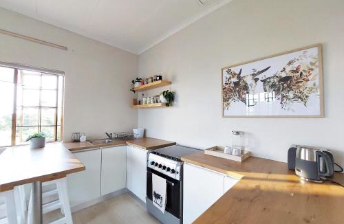 Merrivale Apartment | Upmarket off grid cottage on organic farm in secure estate