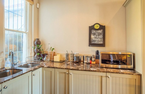 Green Point House | Walk to the Beach from a Cape Dutch Heritage Bungalow