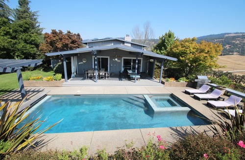 Riebli-Wallace Neighborhood Group House | Wine Country Retreat with Pool, Vineyard, Trampoline, Putting Green and Hot Tub