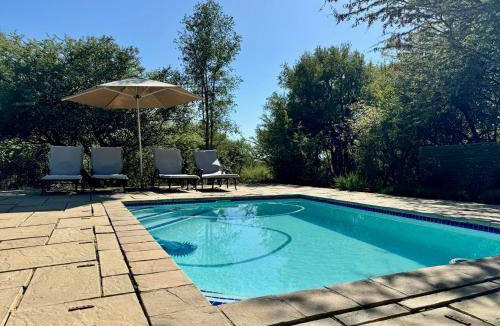 Pilanesberg National Park Cabin | 500 m² Lodge ∙ 4 bedrooms ∙ 12 guests
