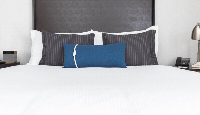 Full Bed Stay in Historic 1926 Hotel | Free Breakfast Waterfront is Steps Away