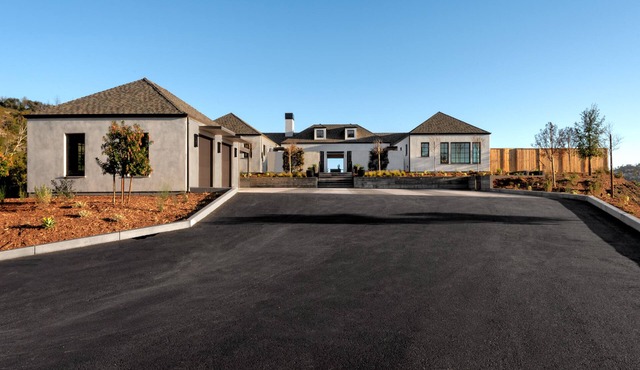 Gated, single-level, Modern California style home with views in Wine Country