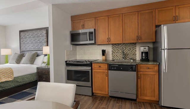 Heavenly Village - Grand Residence-Studio Condo with kitchen & private hallway.