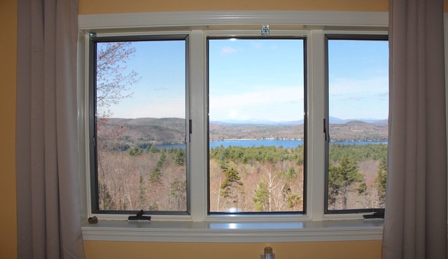 Lake Sunapee house with spectacular vistas close to skiing, hiking and swimming! in Newbury