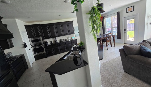 Spacious 4-bedroom Smart Home in Argyle with AC/Heat, small gym, and TVs galore in Argyle