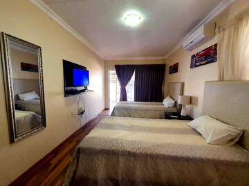 2 people Room in one of the select guesthouses in Mahikeng