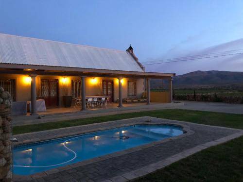 Kannaland House | 200 m² Farmhouse ∙ 3 bedrooms ∙ 8 guests