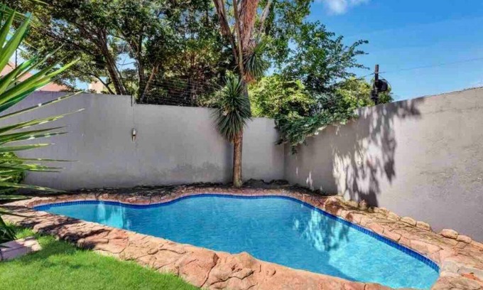Greater Johannesburg Metropolitan Area House | Modern & Spacious 4 Bed, Home in Heart of Sandton!