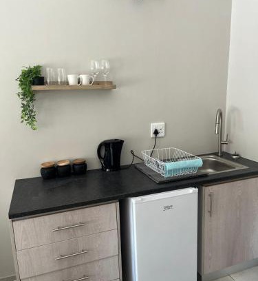George Apartment | Pebbles