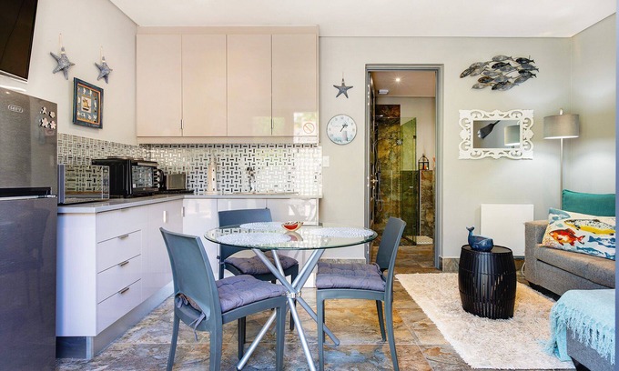 Camps Bay Apartment | Solar Powered Breathtaking Sea Views of Camps Bay with Private Outdoor Terrace.