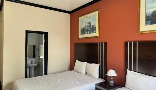 Double Room with Two Double Beds and Private Bathroom