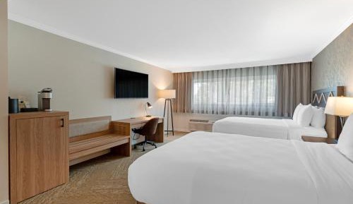Queen Room with Two Queen Beds and Walk-In Shower - Interior Entrance/Non-Smoking