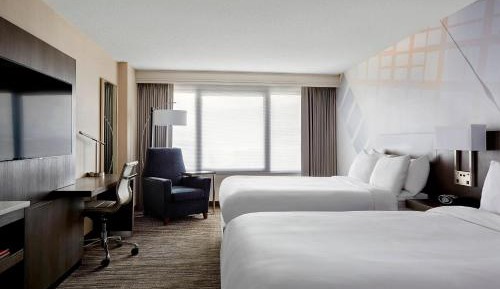 M Club Guest Room with two double beds and M Club lounge access