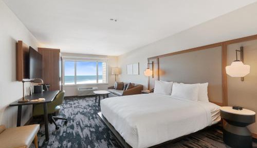 King Suite with Partial Ocean View and Sofa Bed
