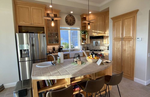 San Martin House | An elegant B&B with a pool & hot tub located above Moose Mountain Vineyards