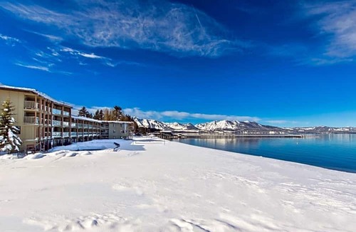 South Lake Tahoe Resort | Lakeview Lodge Room: 2 Queen Beds, Full Kitchen & Gas Fireplace | Private Beach