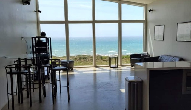 Sweeping ocean views in stunning modern house on 20 acres