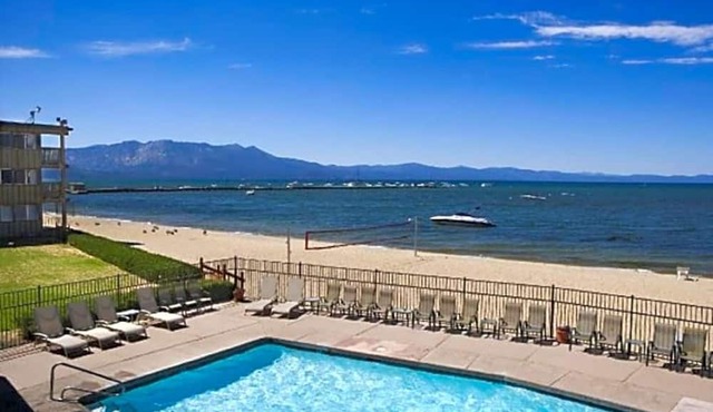 Lakeview Lodge Room: 2 Queen Beds, Full Kitchen & Gas Fireplace | Private Beach